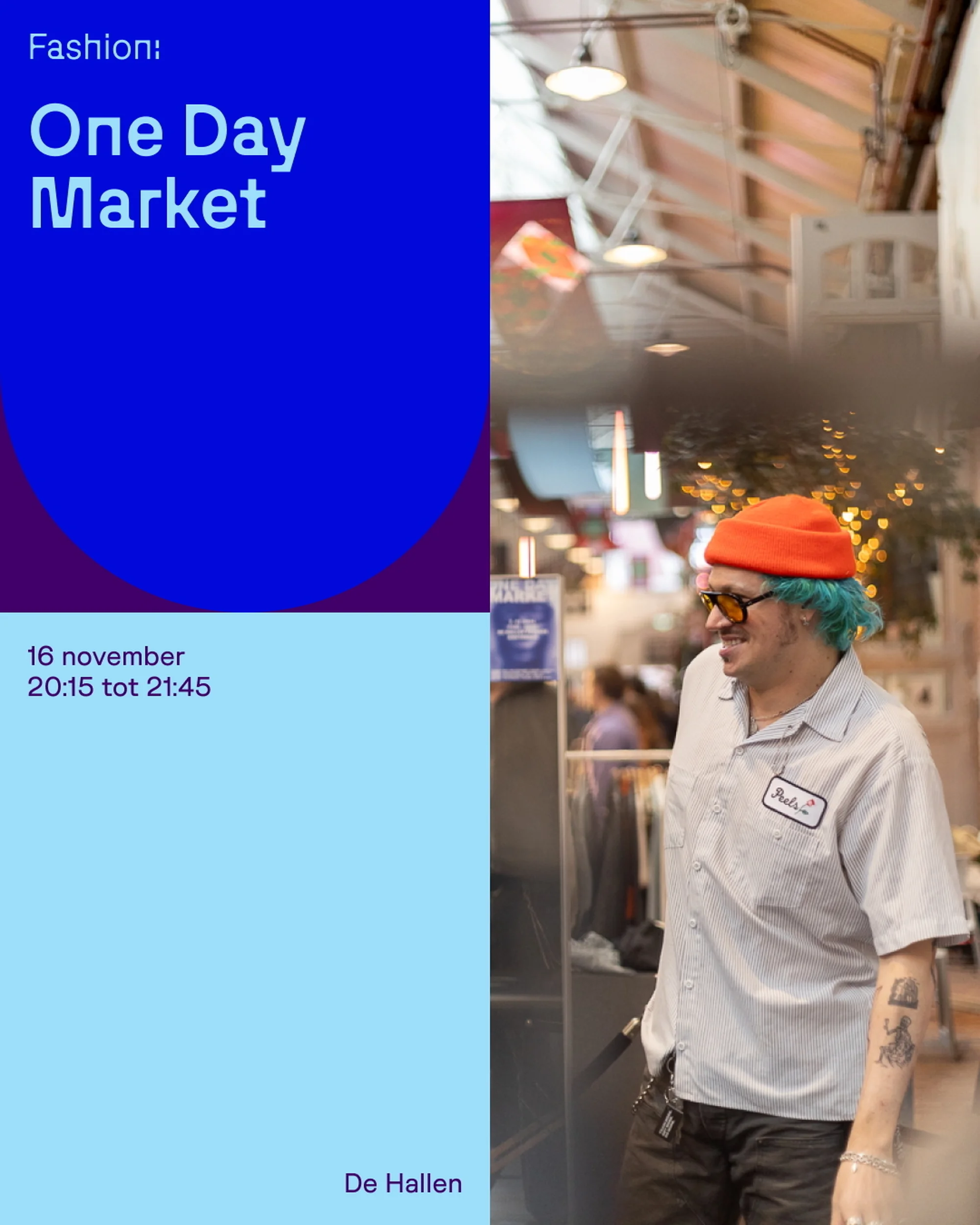 Man with blue hair and orange beanie stands in front of market. Event promotion poster on left. Market has clothing rack and signage.