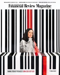 Gina Cass-Gottlieb posing against a bold black and white barcode patterned background for magazine cover portrait