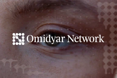 Extreme close-up of a human eye with Omidyar Network logo and graphic pattern overlay