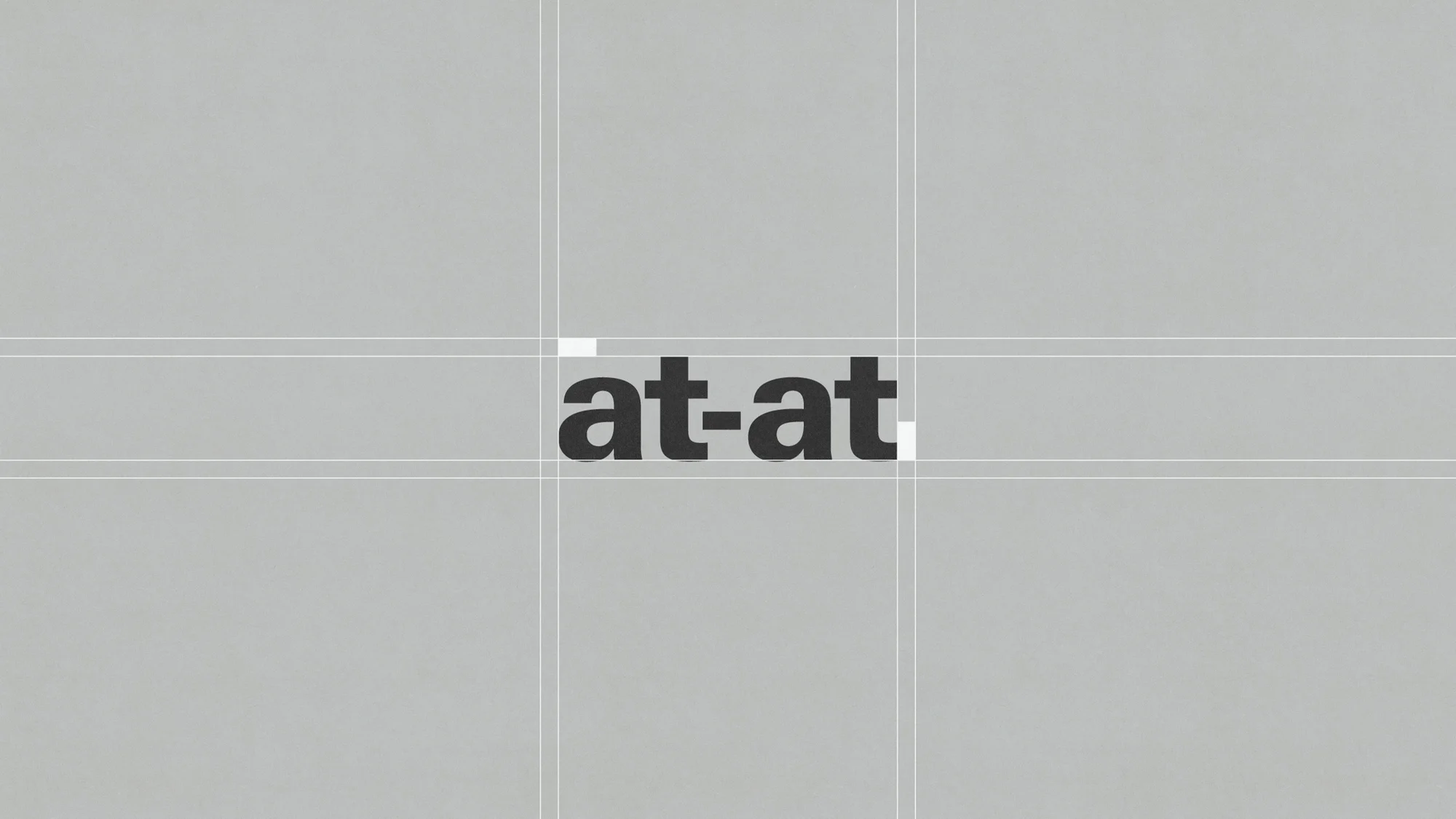 Abstract art with the text 'at-at' centered on a gray background with subtle gridlines.
