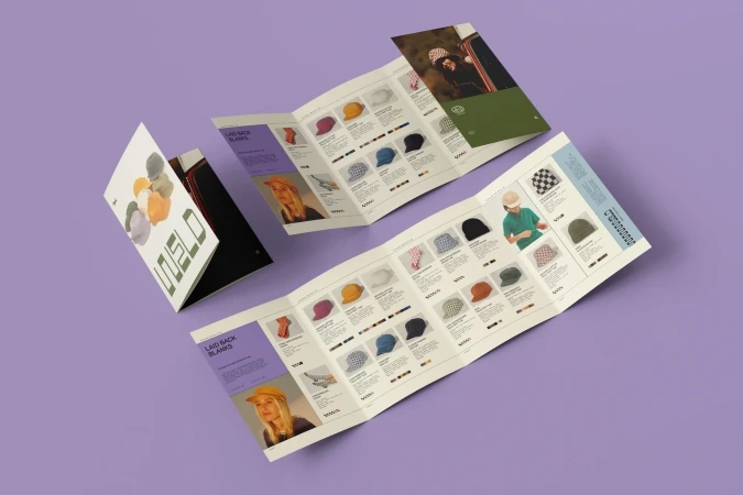 Product catalog featuring an array of hats showcased on a purple backdrop, promoting Laid Back Blanks' headwear collection.
