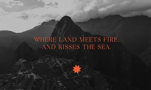 Black and white aerial view of a mountain landscape with overlapping typographic quote and red geometric logo
