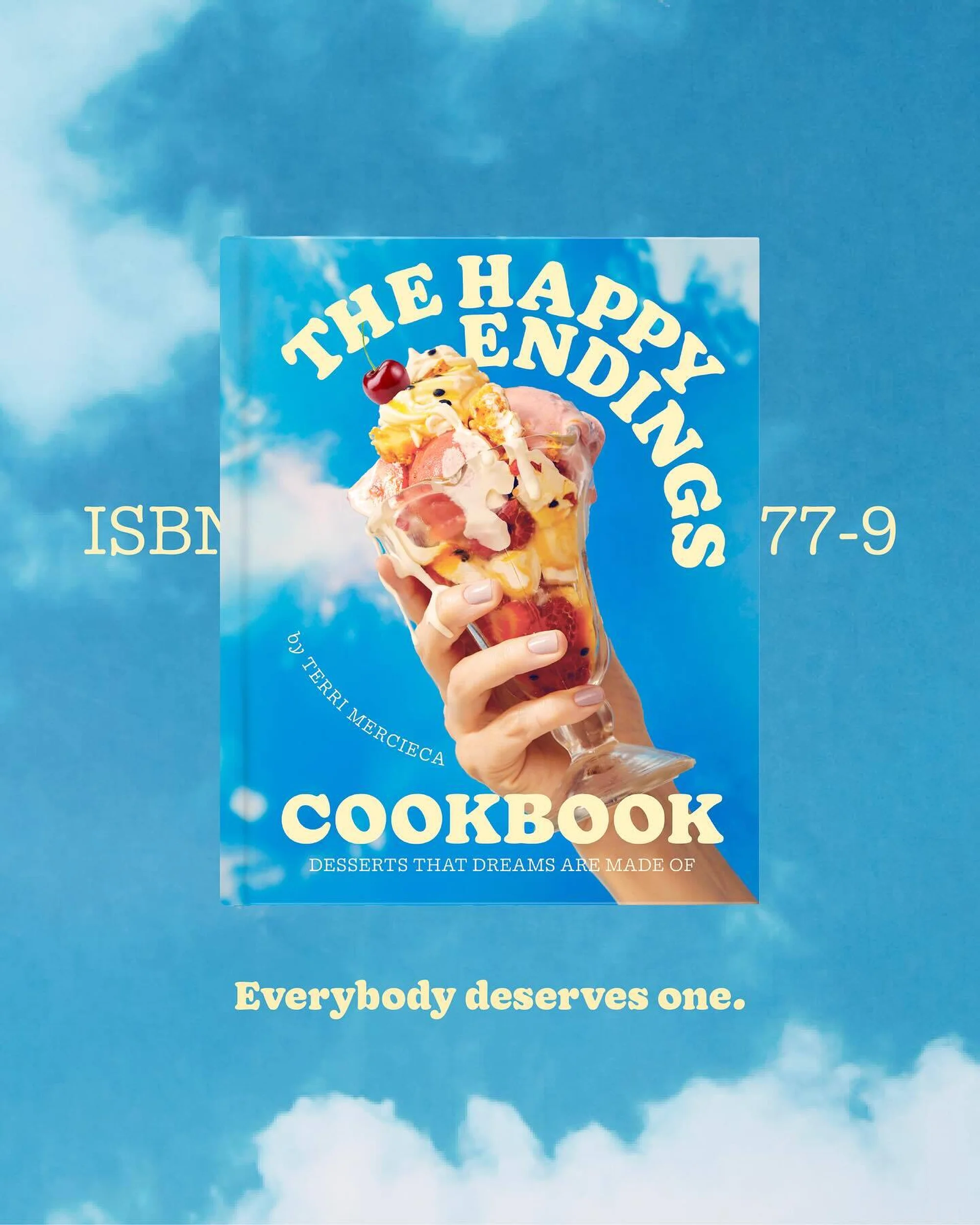 Cookbook cover featuring a sundae dessert in a clear glass held by a hand, against a blue sky with clouds, for dessert lovers.