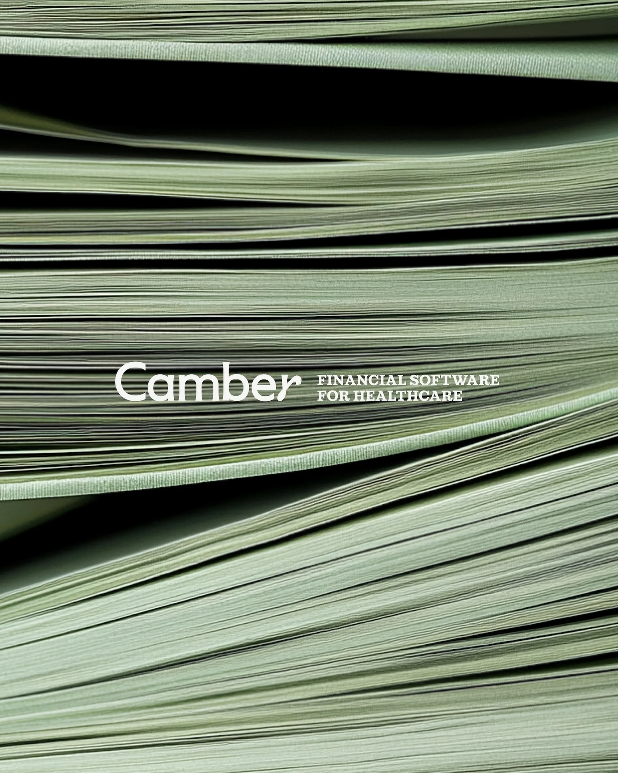 Stack of financial software brochures for healthcare, featuring the 'Camber' logo, arranged in a textured, layered display. 