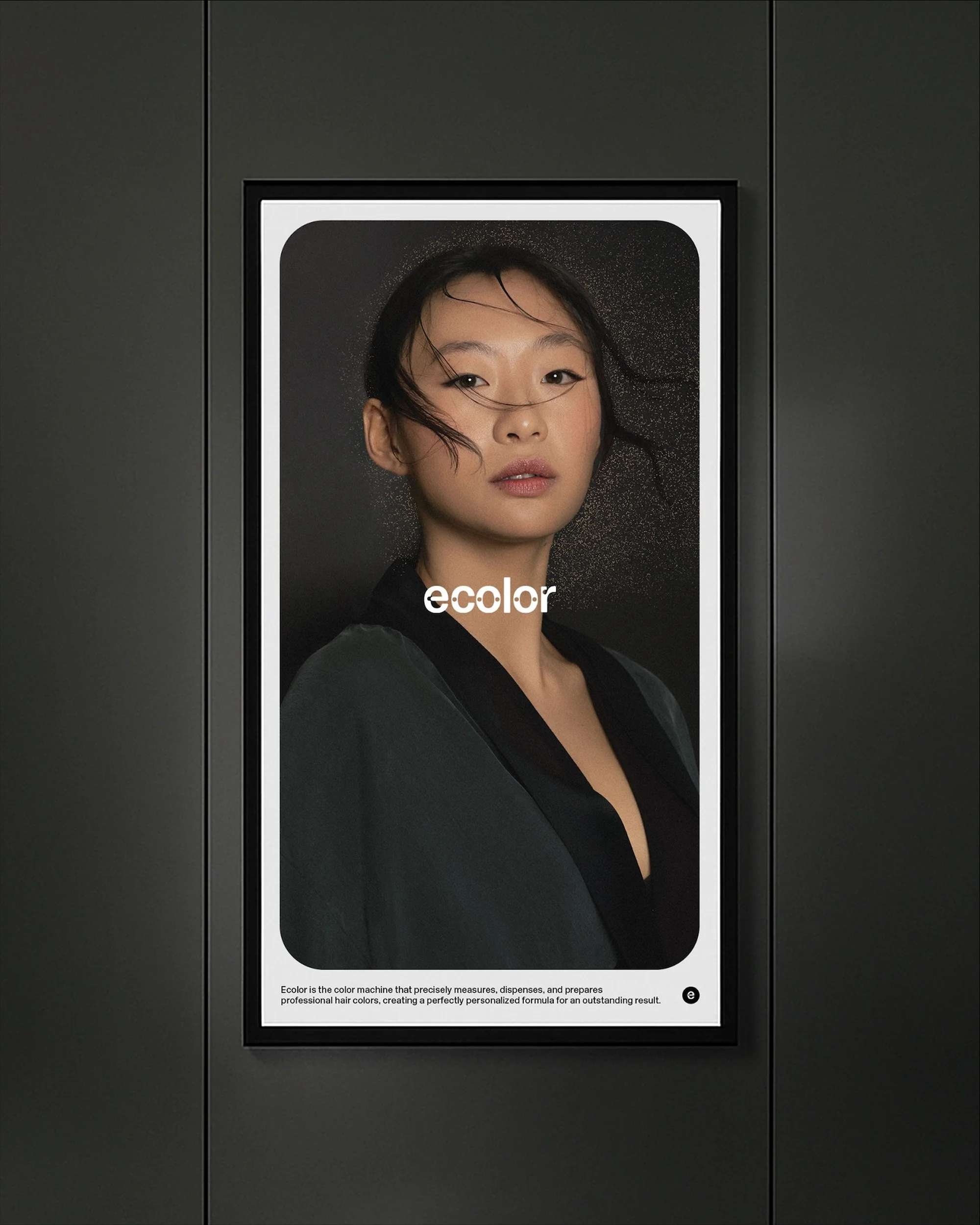 Poster featuring an Asian woman with hair swept back, wearing a dark green top against a dark background, promoting hair color.