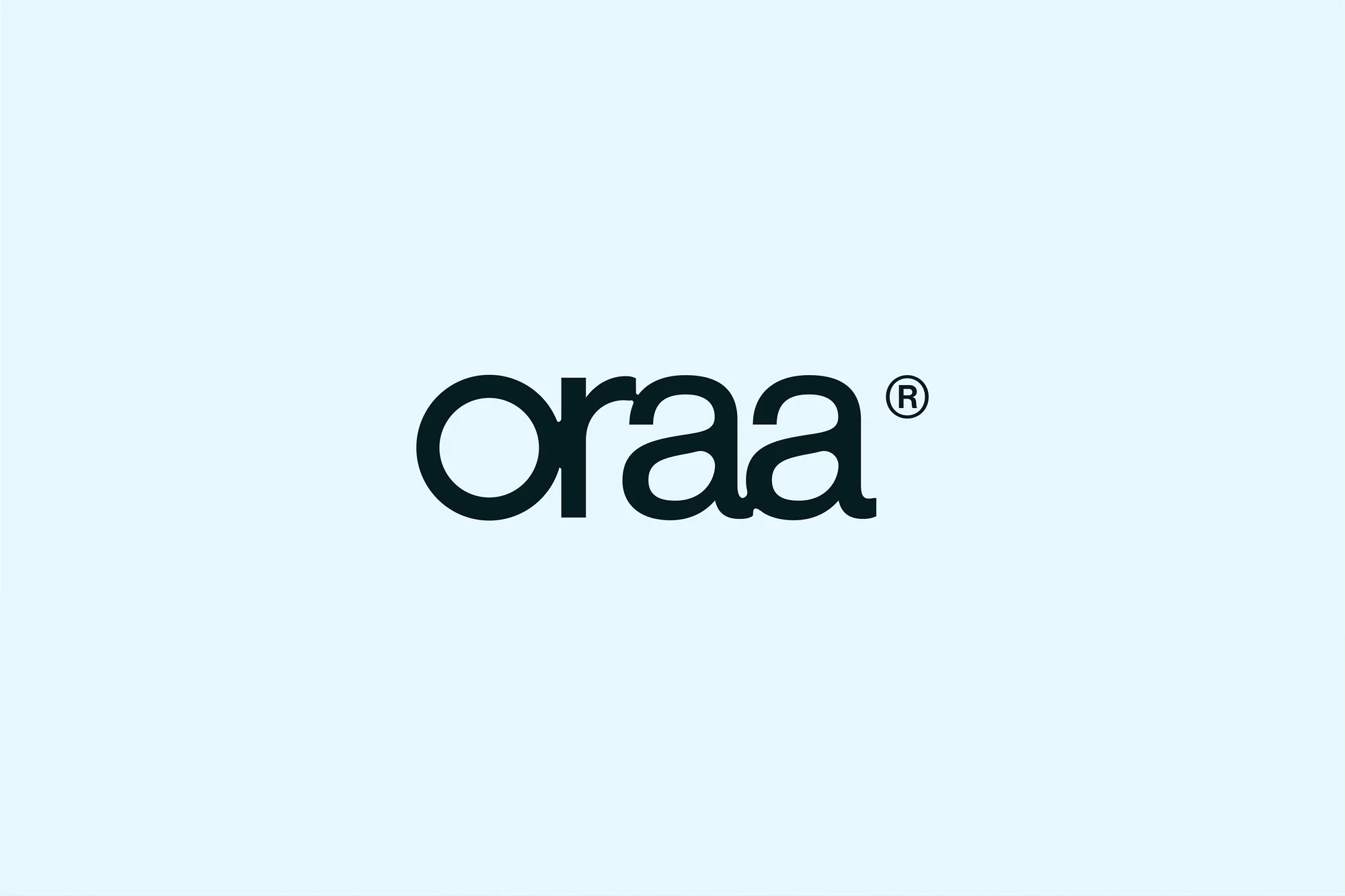 The word “oraa” in bold dark teal lettering with a registered trademark symbol on a light blue-white background. Simple logo graphic.