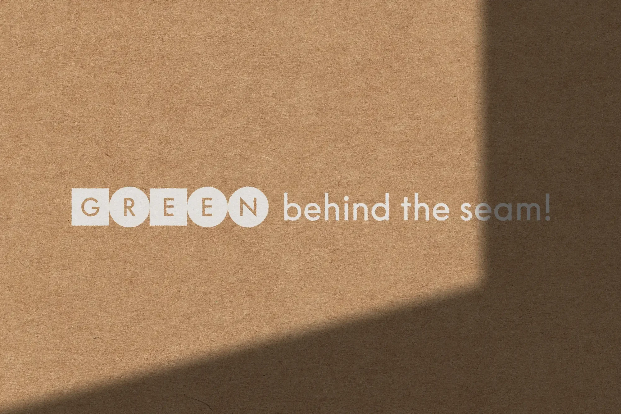 Tan background with white text reading 'GREEN behind the seam!' and a shadow cast in the corner.