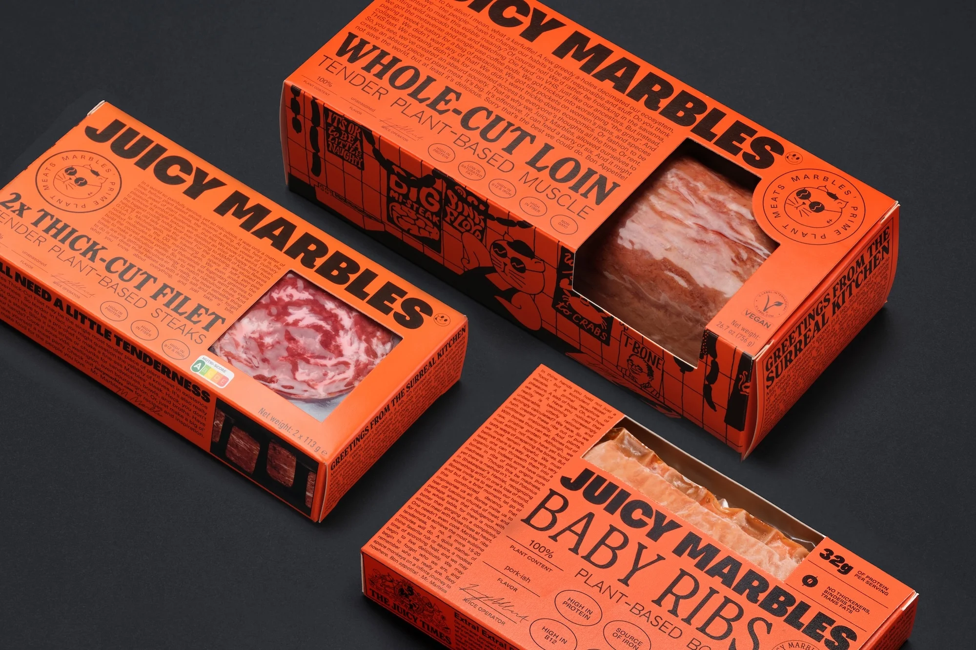 Three packages of Juicy Marbles plant-based meat alternatives are displayed against a dark background. The product boxes are bright orange.