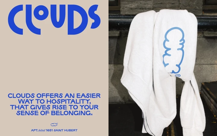 White hooded sweatshirt hangs on a metal bar, with blue text and graphic on a tan background with product advertising text on the left.