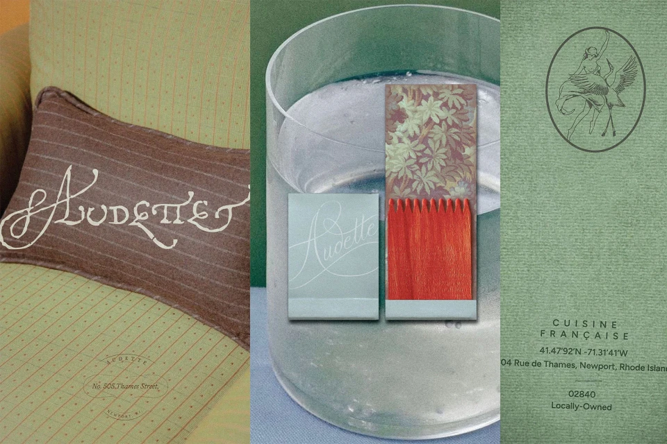 Close-up of a pillow with embroidered text, a glass of water, and a restaurant menu in a composition showcasing textures and text.