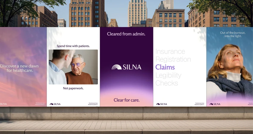 Billboard advertisements for SILNA with health and wellness messaging are displayed on a city street with brick buildings and trees.