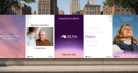 Multi-panel outdoor billboard mockup for Silna healthcare platform displayed on a stone wall in front of city buildings.