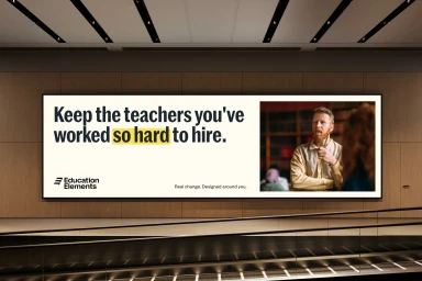 Education Elements brand identity billboard featuring bold typography and a man speaking indoors.