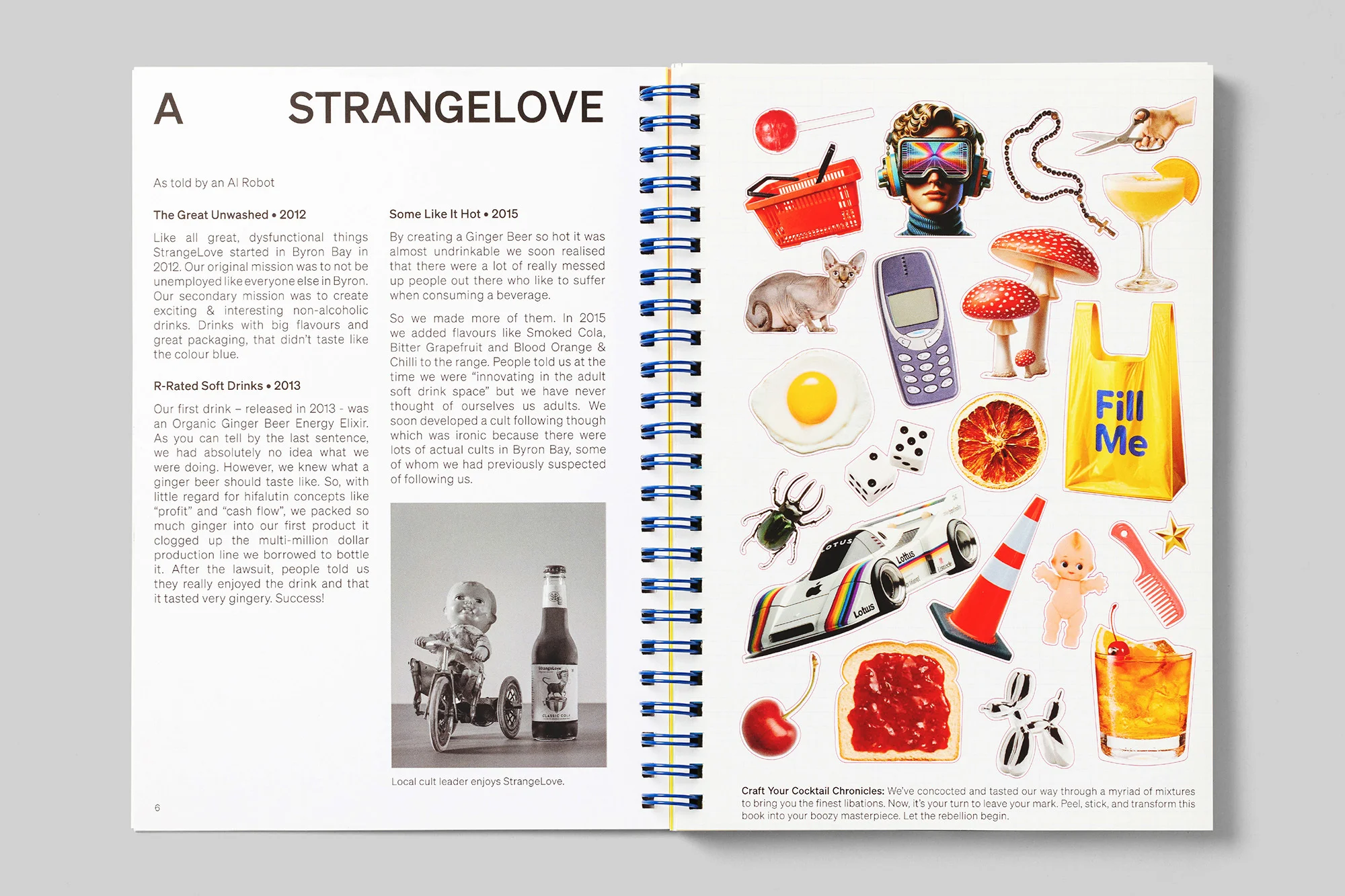 Opened notebook with lifestyle sticker collage. Colorful objects include drinks, sunglasses, phone, car, and mushrooms on white paper.