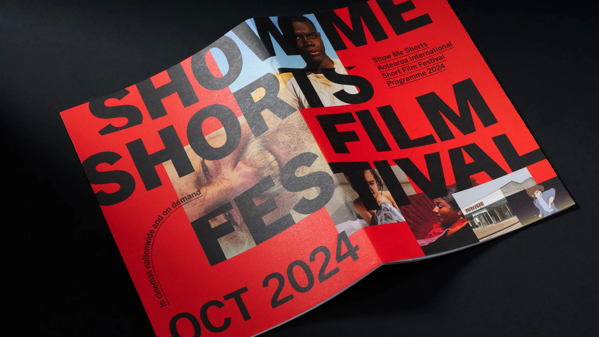 Open magazine with "Show Me Shorts Film Festival" title, film stills, and the October 2024 dates against a dark studio background.