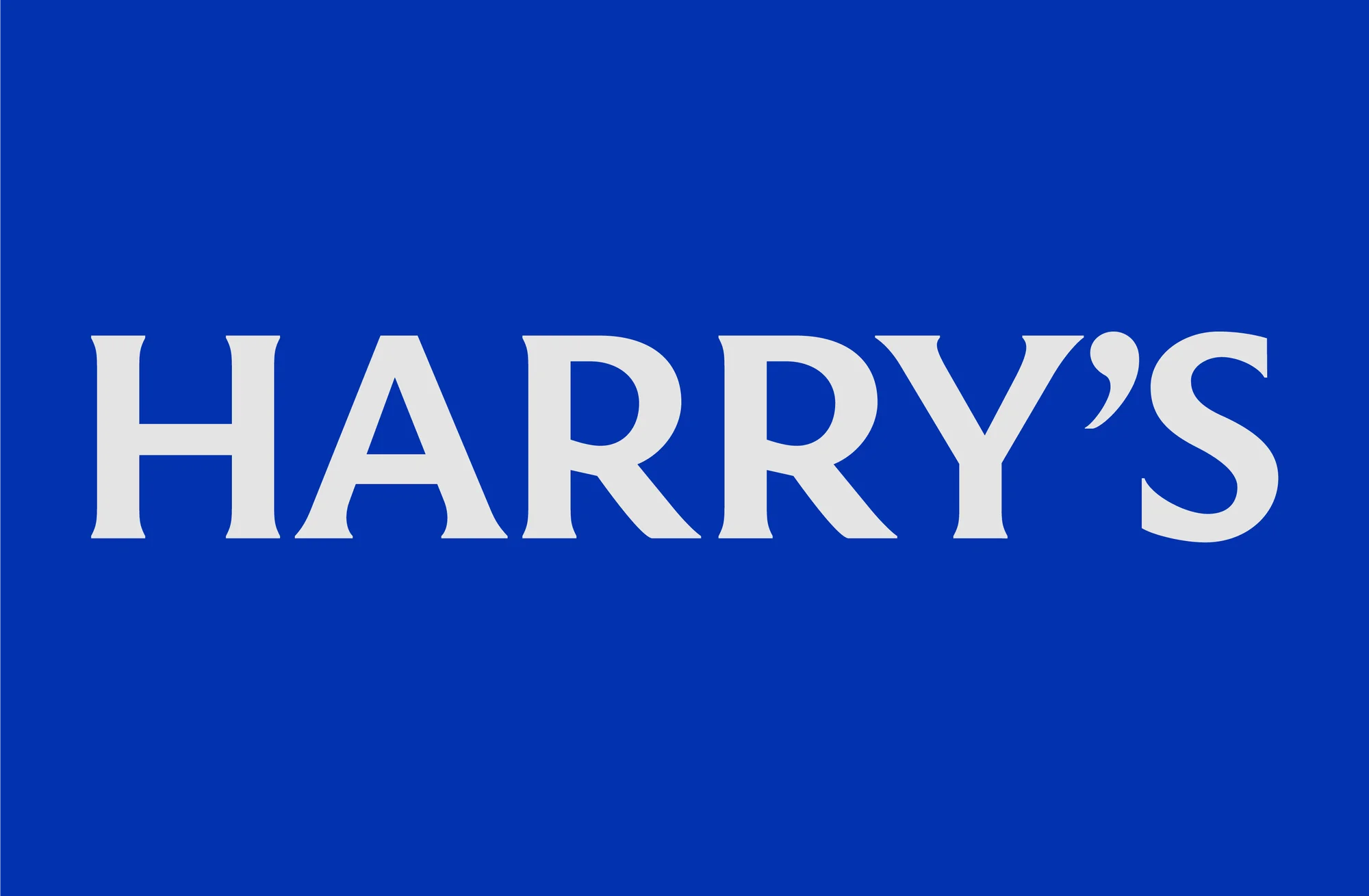Harry's logo displayed in white lettering against a solid dark blue background. The brand name is prominently featured in a clear typeface.