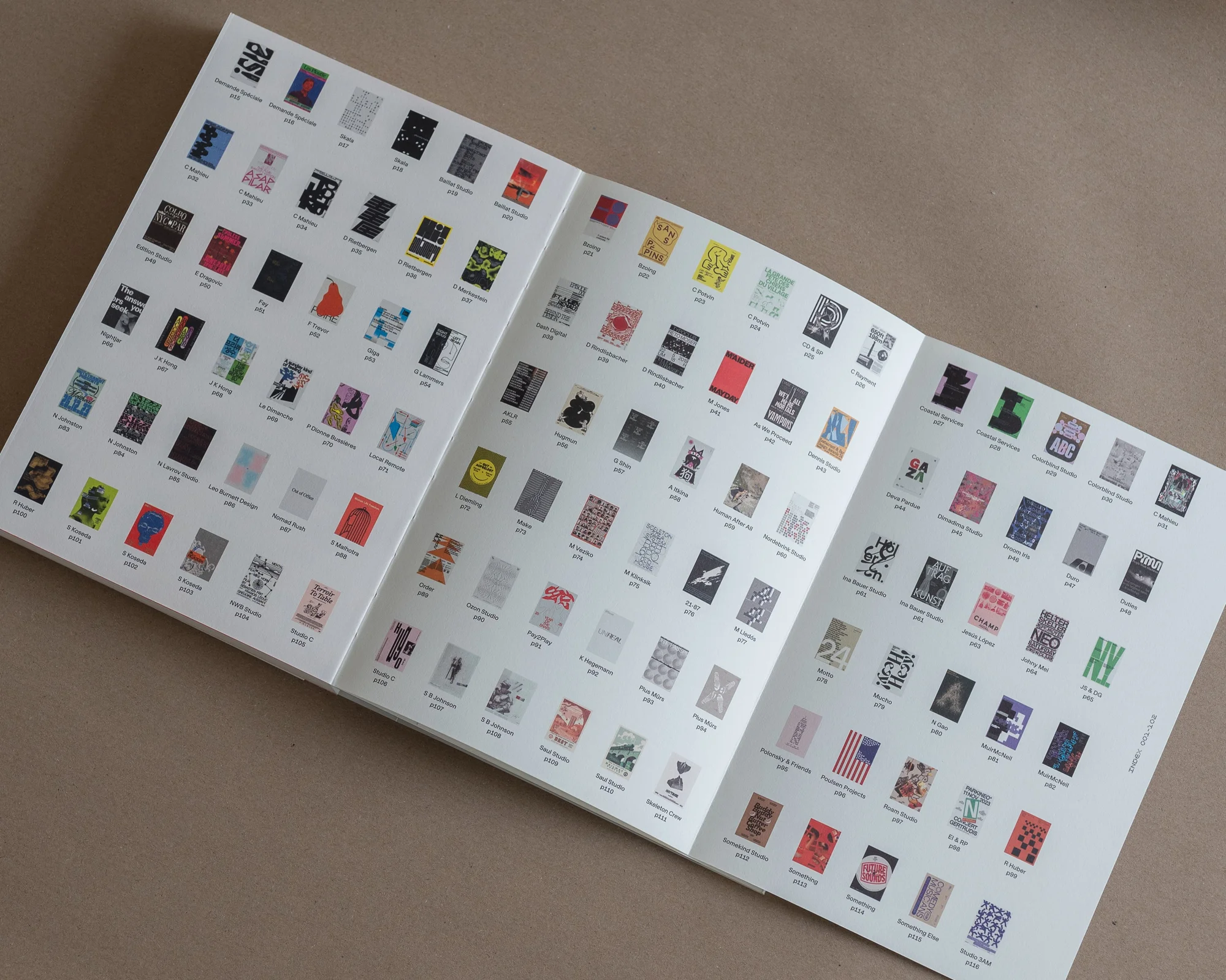 Open booklet featuring multiple small images in grid layout on a white background, showcasing graphic design and typography examples.