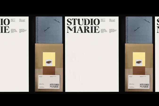 Studio Marie letterhead stationery features graphic design layout, including company name, contact details, and a small photograph, set against black.