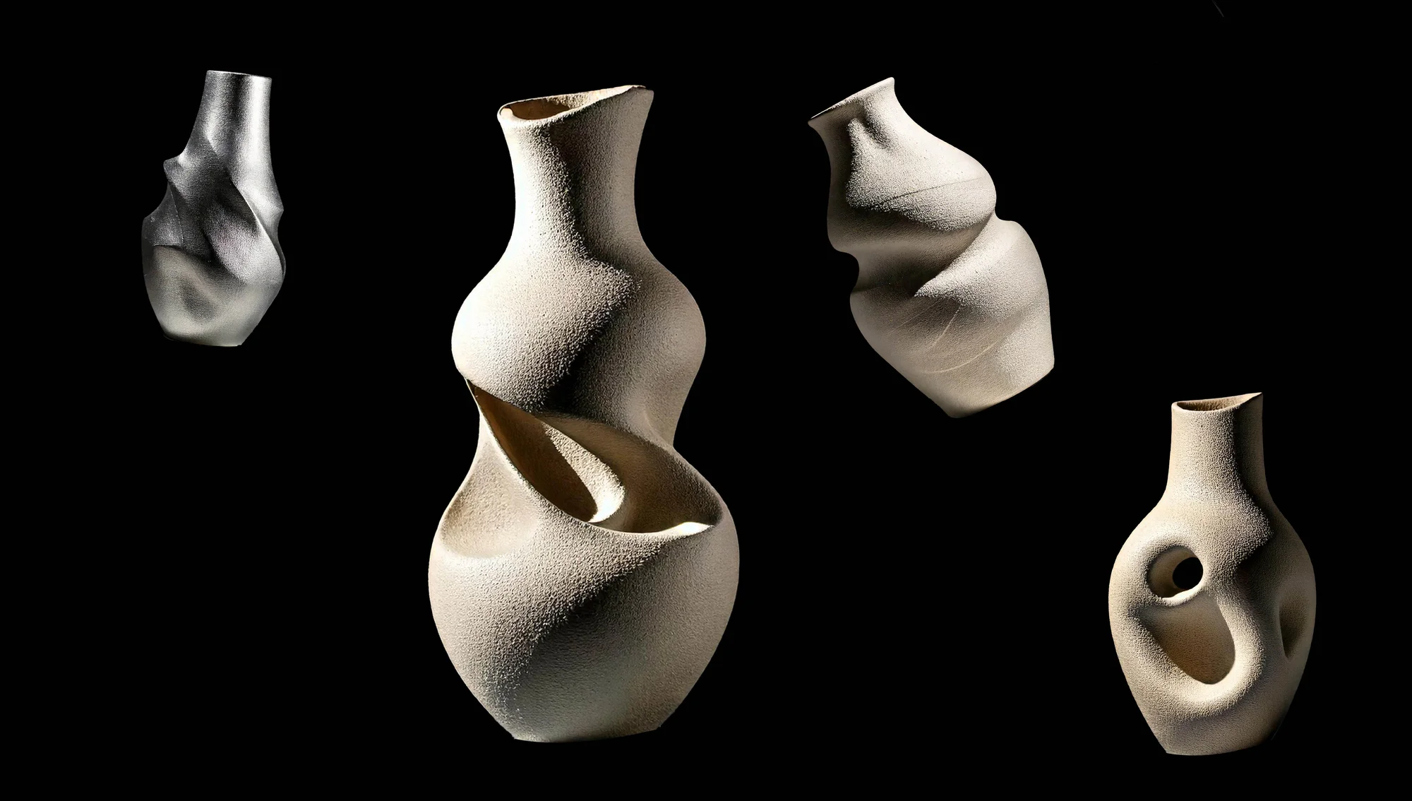 Several artfully designed vases with textured surfaces in cream and silver tones set against a stark black backdrop in a studio setting.