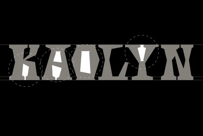 Abstract text art displaying the word 'KADRON' with stylized black and white block letters against a black background.