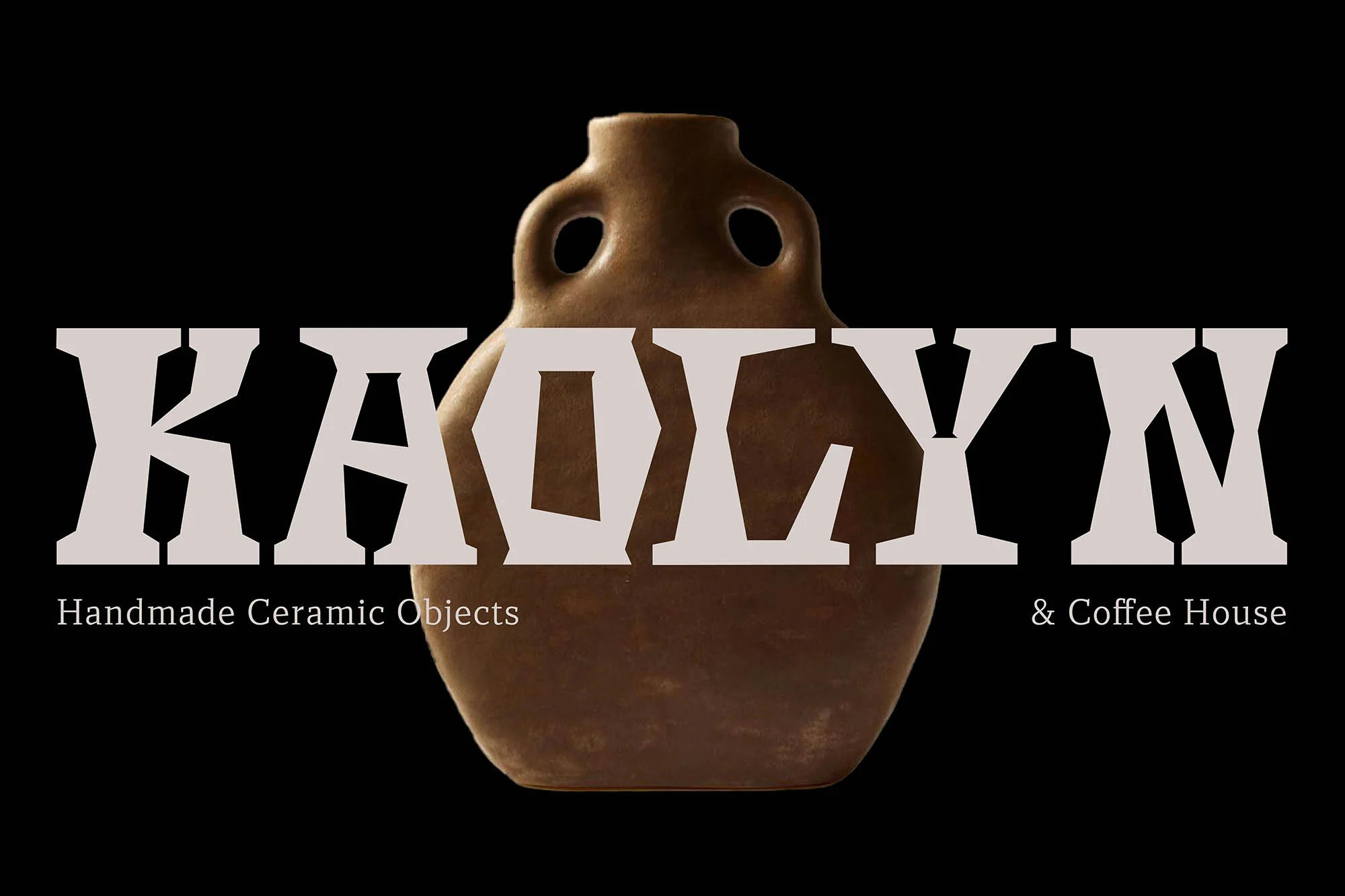 Earthenware jug with two small handles set against a black background with text overlay for a cafe and ceramic object shop.