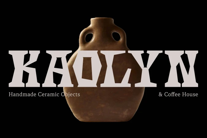 Earthenware jug with two small handles set against a black background with text overlay for a cafe and ceramic object shop.