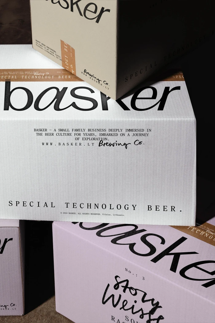Branded product packaging boxes for Basker beer featuring clean minimalist typography and neutral colour palettes.