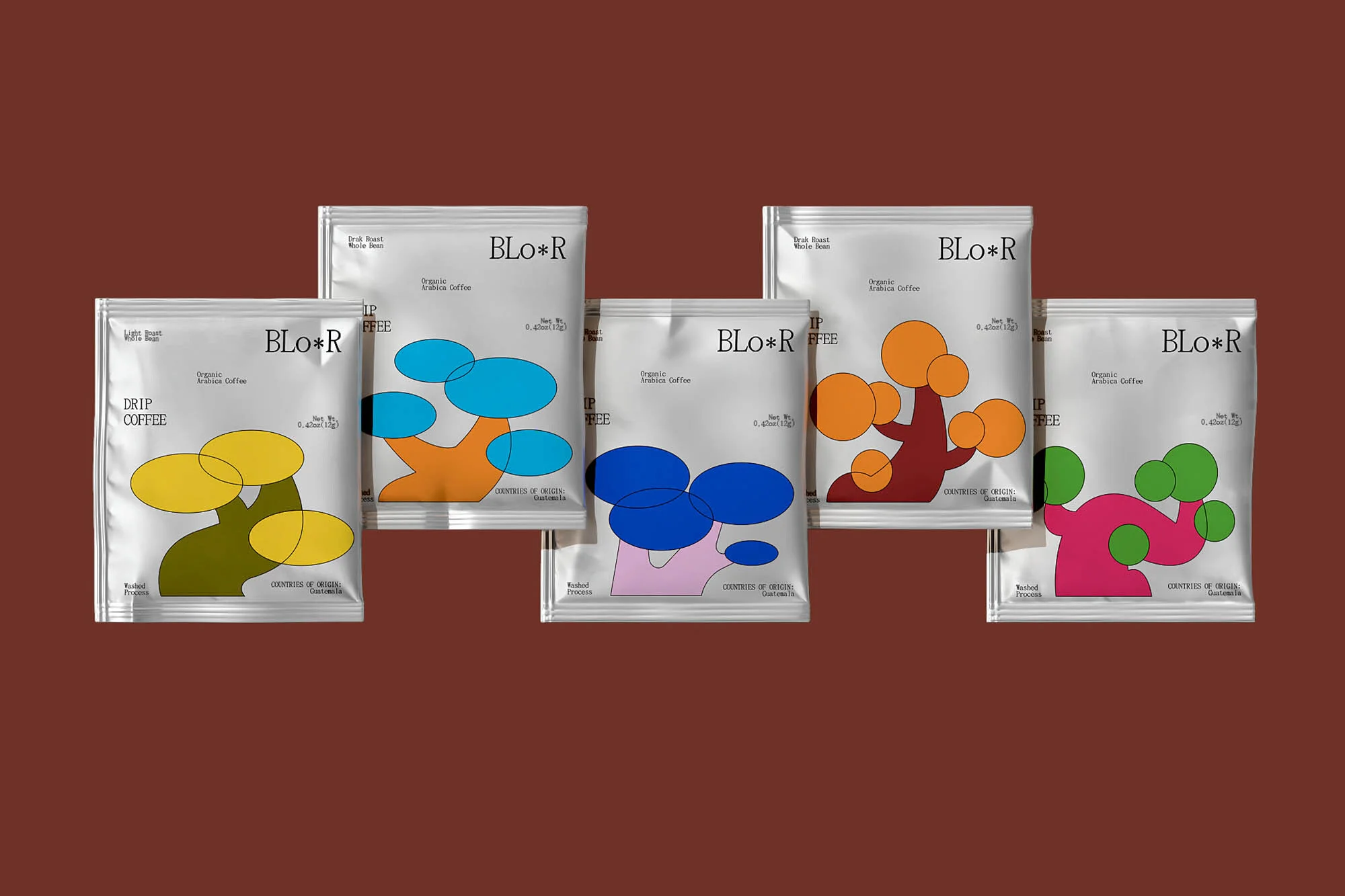 Five BLO*R brand coffee packages with colorful abstract designs, showcasing organic Arabica drip coffee on a solid brown background.
