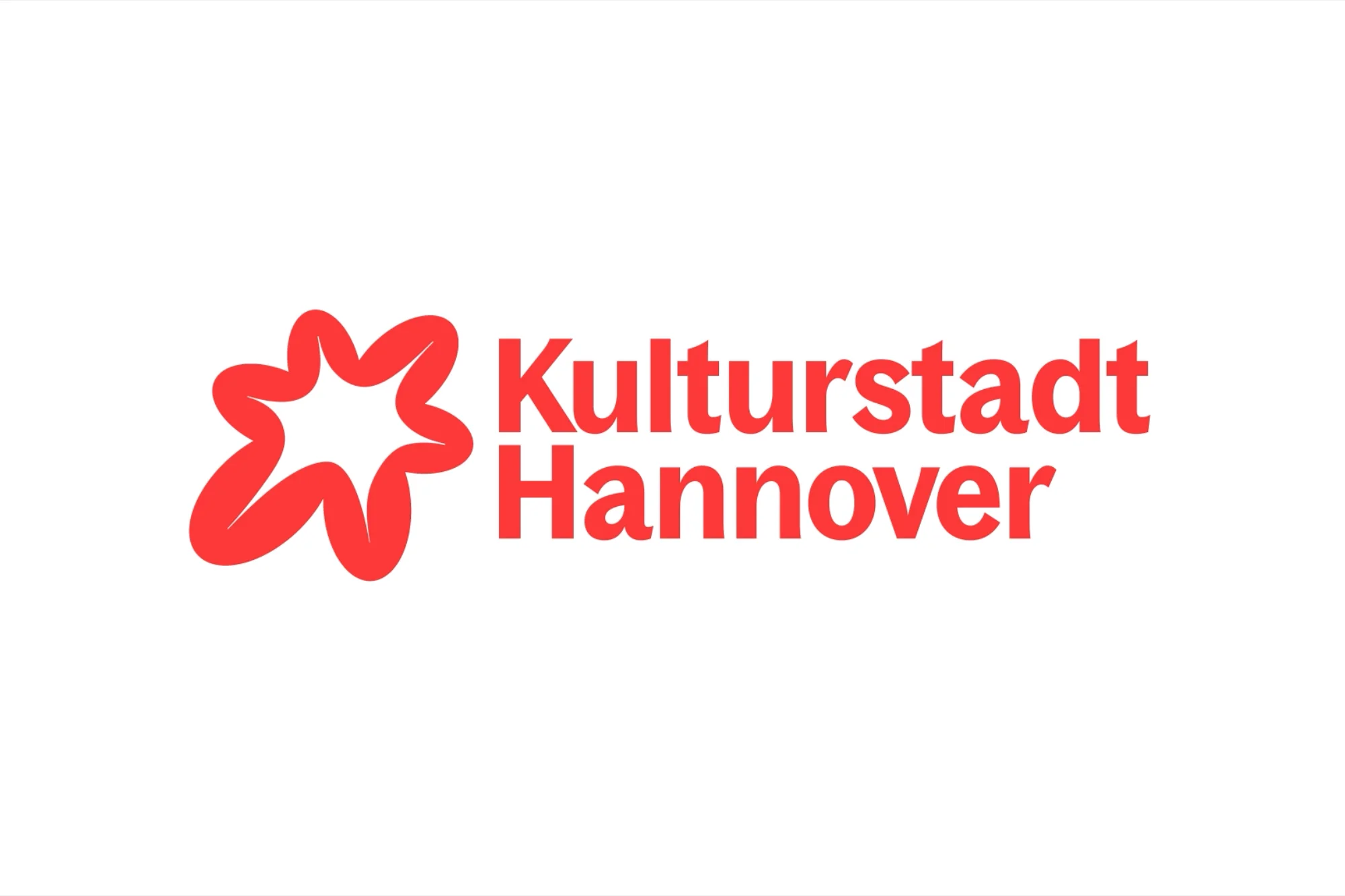 Logo for Kulturstadt Hannover featuring a stylized red star shape and the text 'Kulturstadt Hannover' in red font against a white background.