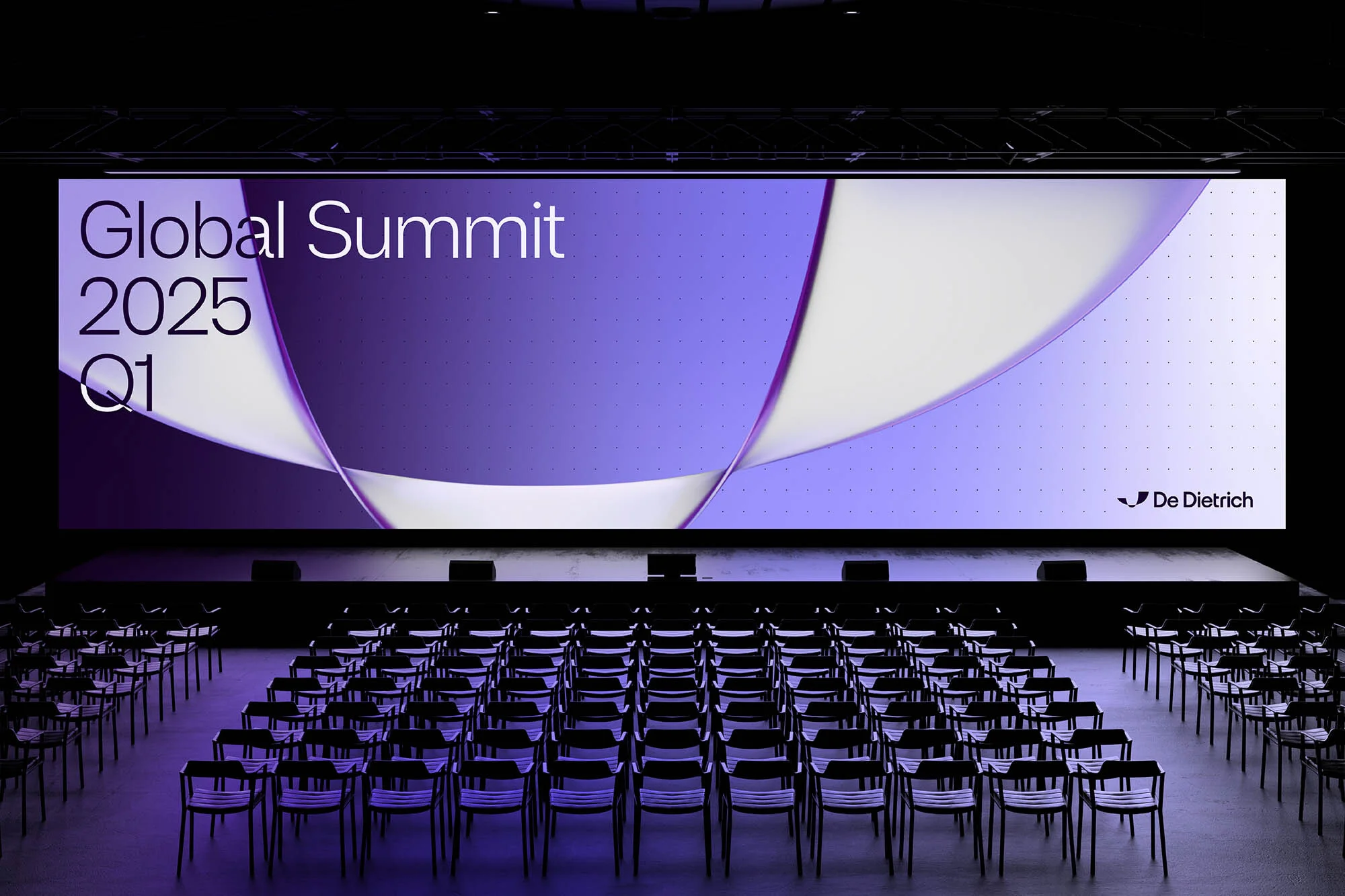 View of an empty auditorium with chairs and a large screen displaying "Global Summit 2025 Q1" and the logo of De Dietrich.