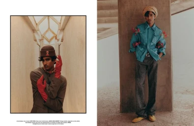 Model Jeenu Mahadevan in a blue jacket and turban with flowers for L'Officiel Hommes Belgium editorial Flower Bomb.