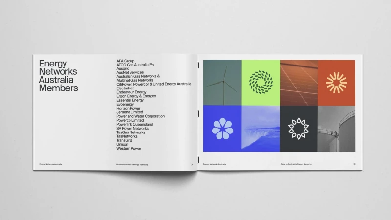 Open magazine spread on a white surface features lists of company names and abstract designs related to energy networks in Australia.
