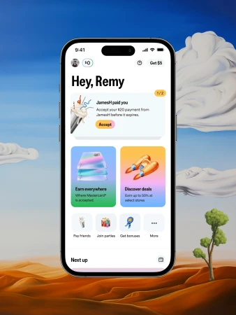 Mobile phone displaying a finance app interface, set against a stylized background of a desert landscape and sky with clouds.