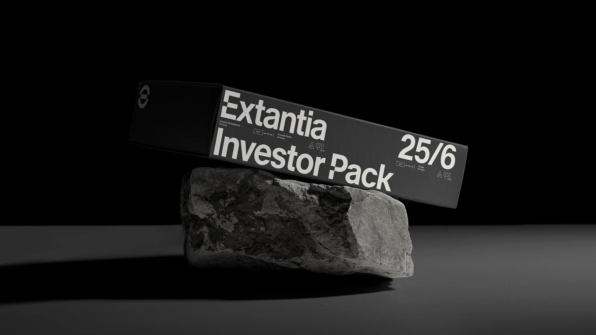 Black box labeled 'Extantia Investor Pack 25/6' rests on a textured grey rock against a dark backdrop, product presentation for financial audience.