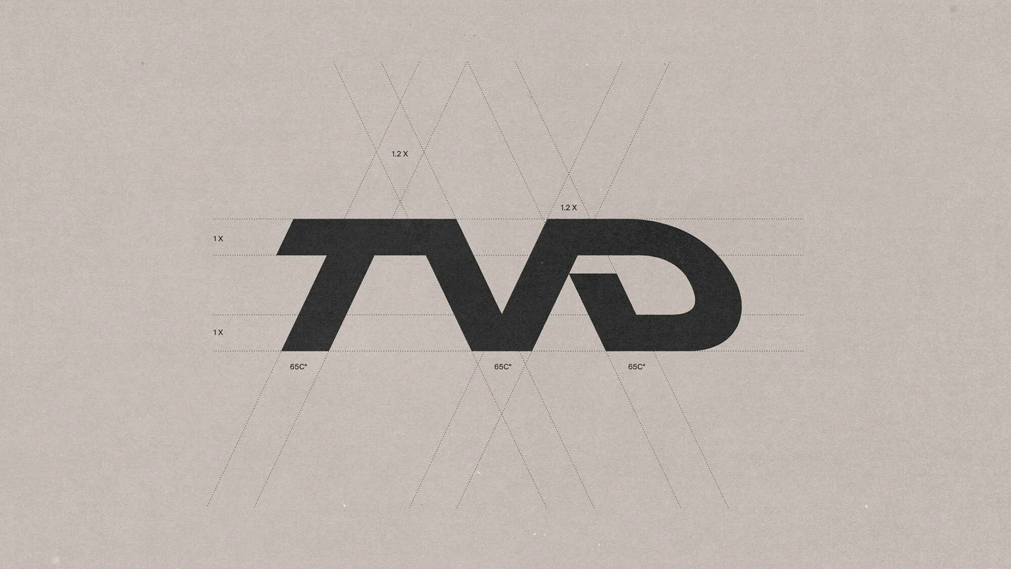 Letter-based logo design featuring the monogram 'TVD' with intersecting lines, set on a textured, light gray background.