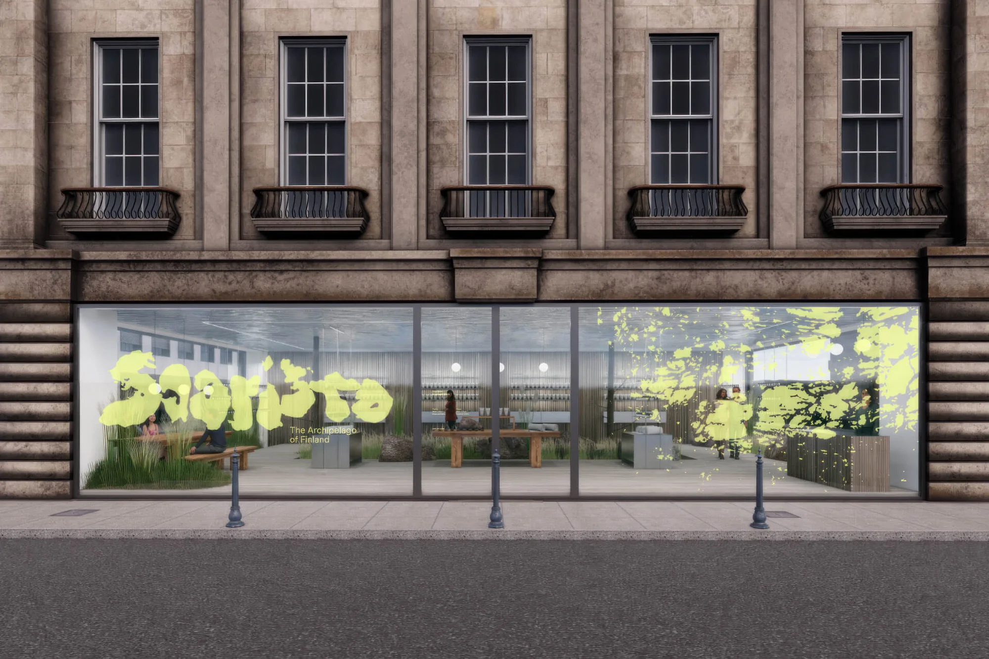 Storefront of a stone building with large windows displaying an interior space with plants and furniture; text on the glass.