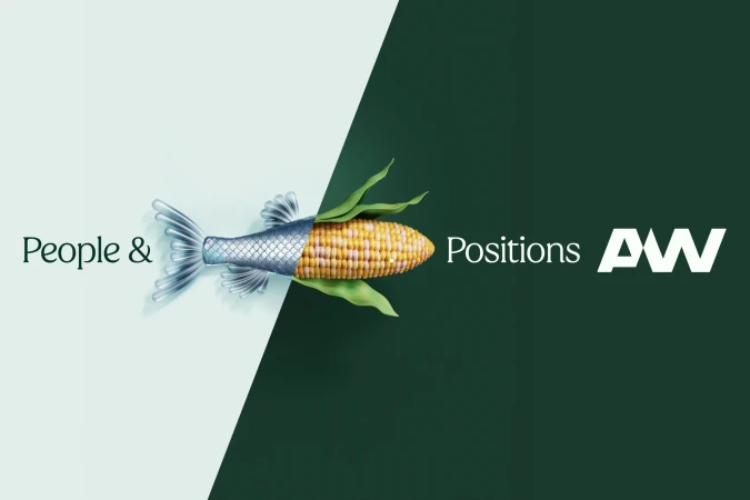 Surreal ad with fish tail merged to corn cob, creating a hybrid food concept, set against a split-tone green and white background.