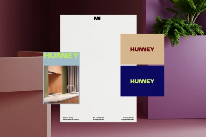 Promotional shot of Hunney's interior design work. The image features a kitchen interior framed by color blocks, and the company logo.