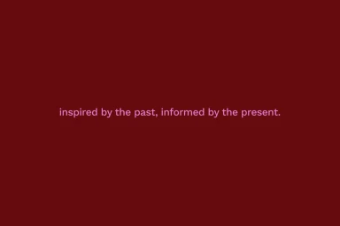 Deep burgundy background with centered pink sans serif typography reading inspired by the past informed by the present.