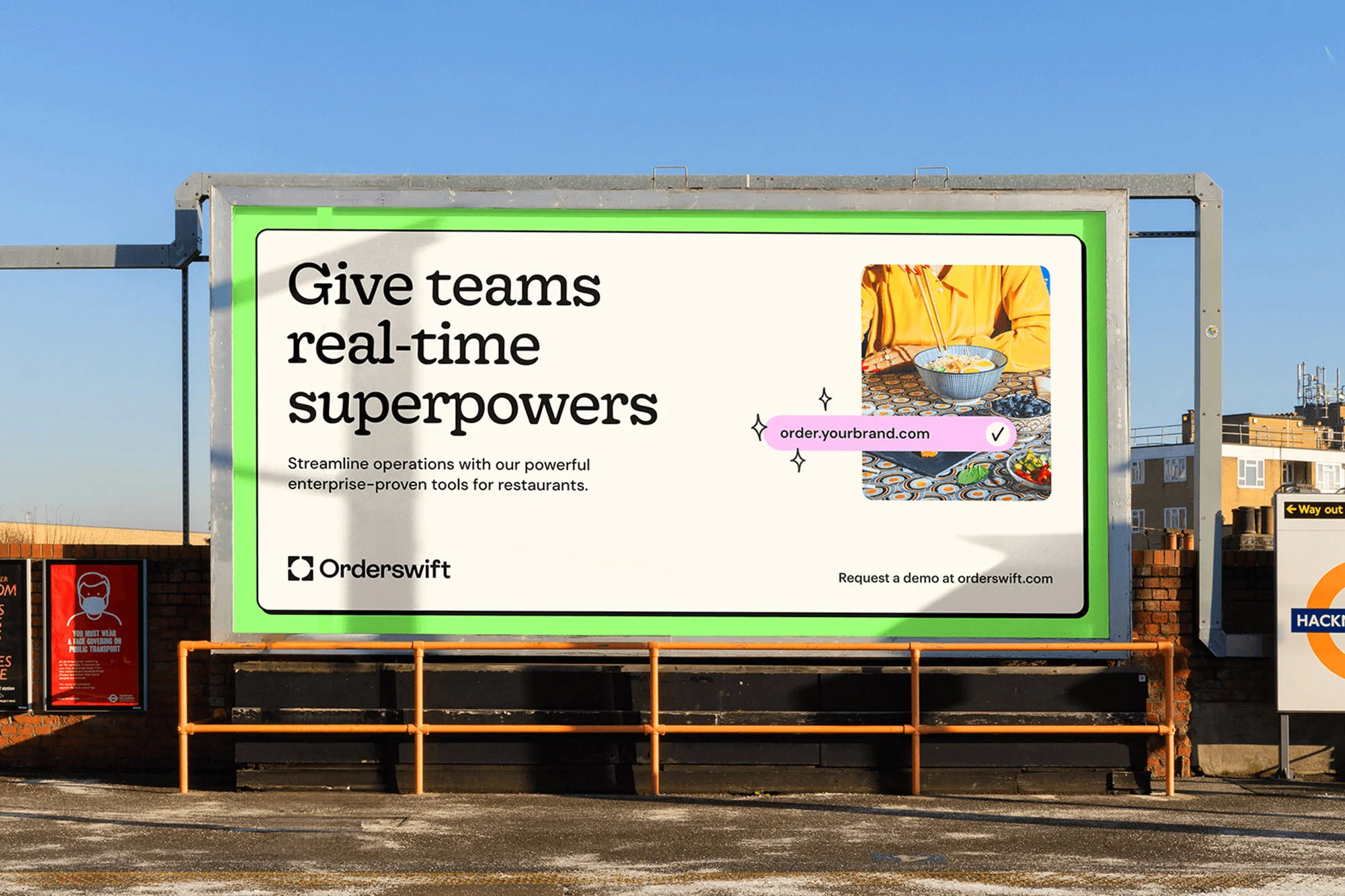 Orderswift billboard in an urban setting showcasing real-time superpowers for restaurant teams, promoting a demo at orderswift.com.