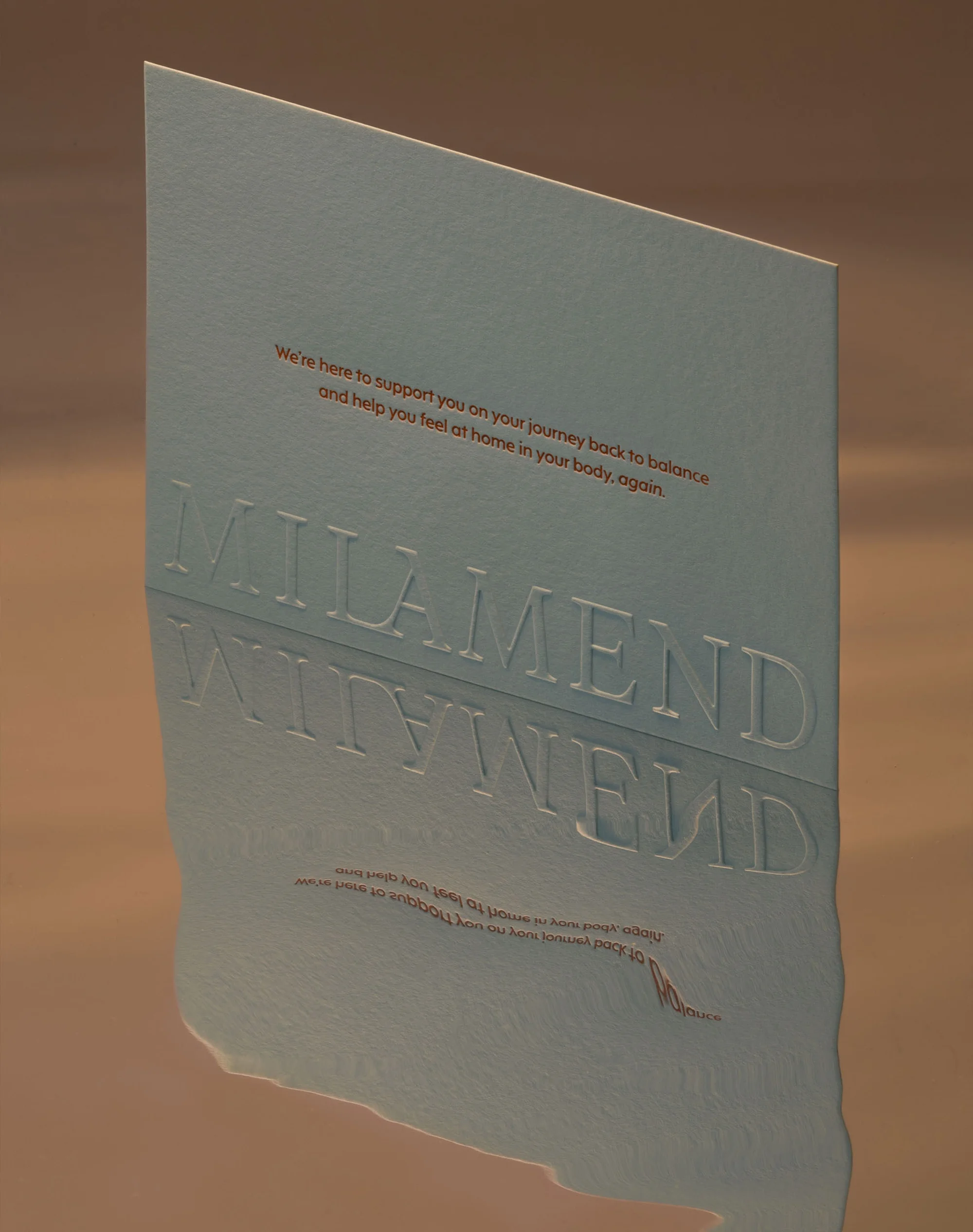 Textured light blue promotional card featuring the text 'We're here to support you on your journey back to balance'.