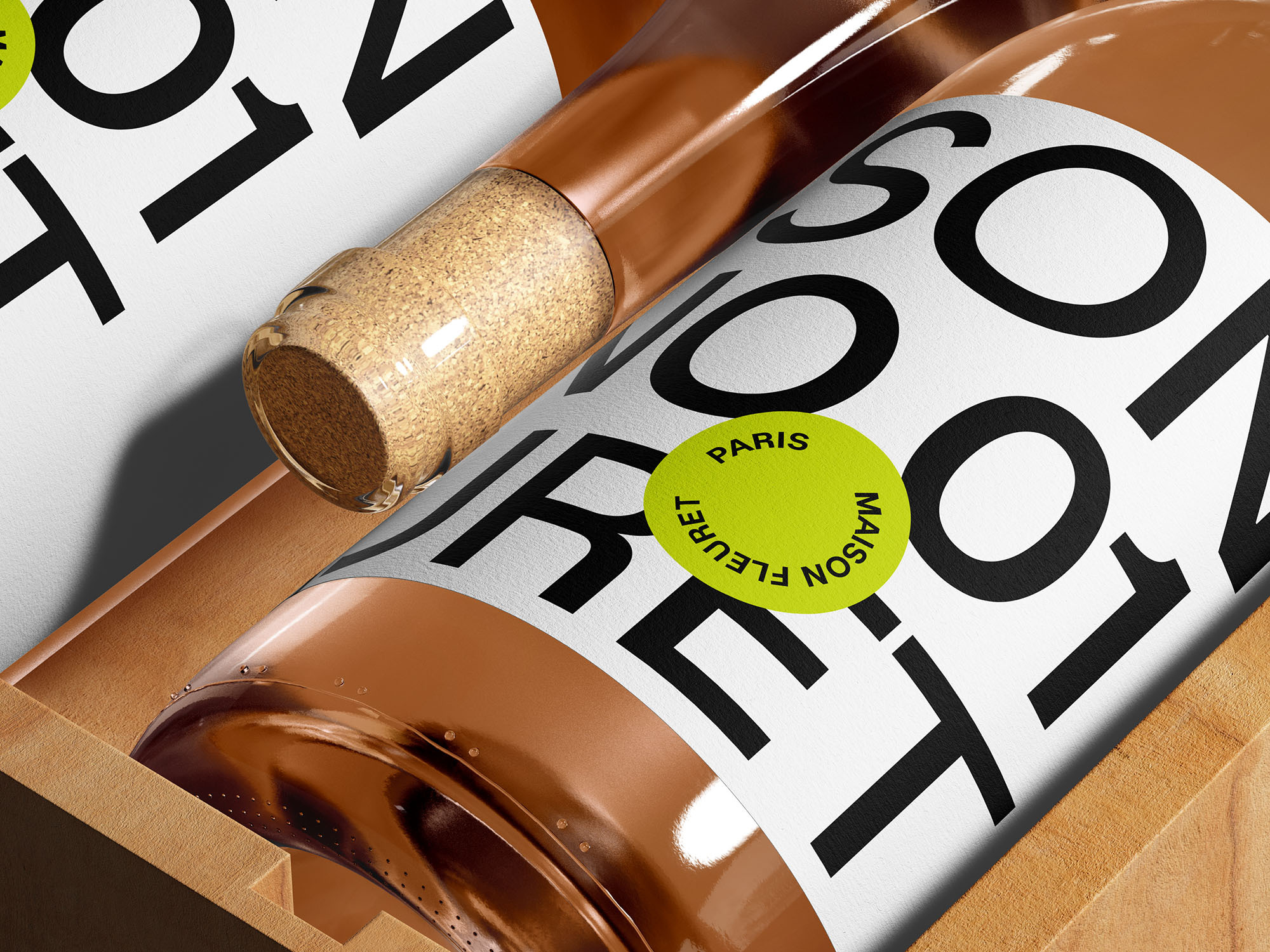 Two bottles of Maison Fleuret rose wine in a wooden box with clear labels in a minimalist design, showcasing product photography.