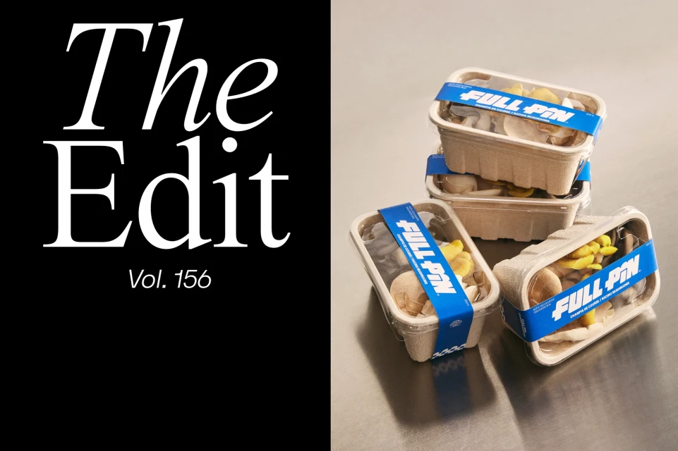 Three stacked food containers with various mushrooms and a blue Full Pin label sit on a gray surface against a black and white background.