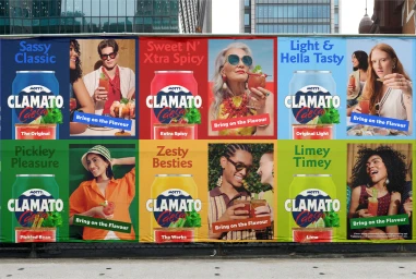Large outdoor billboard displaying Mott's Clamato brand identity campaign with colorful panels featuring various canned drinks and people.