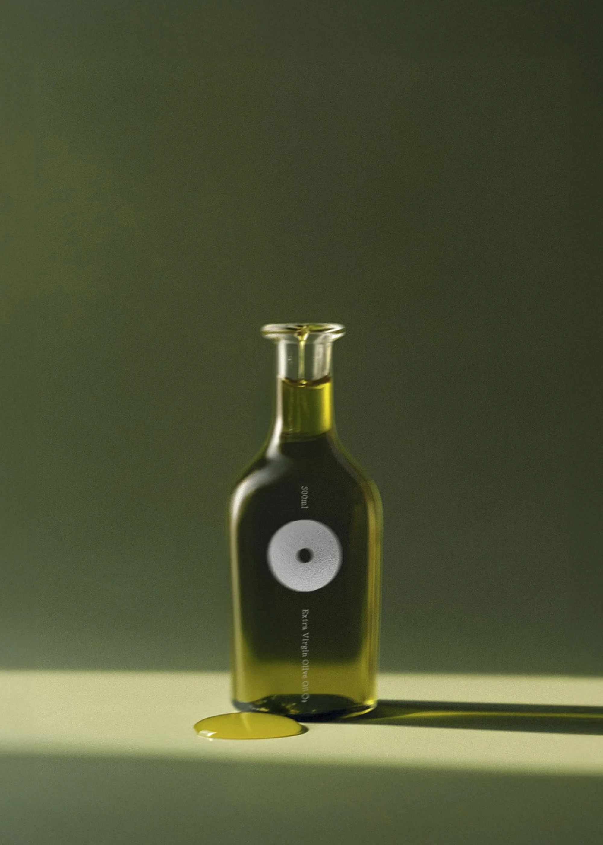Olive oil bottle on a green surface with spilled liquid, studio lighting, minimalist style, and a clean, uncluttered presentation.
