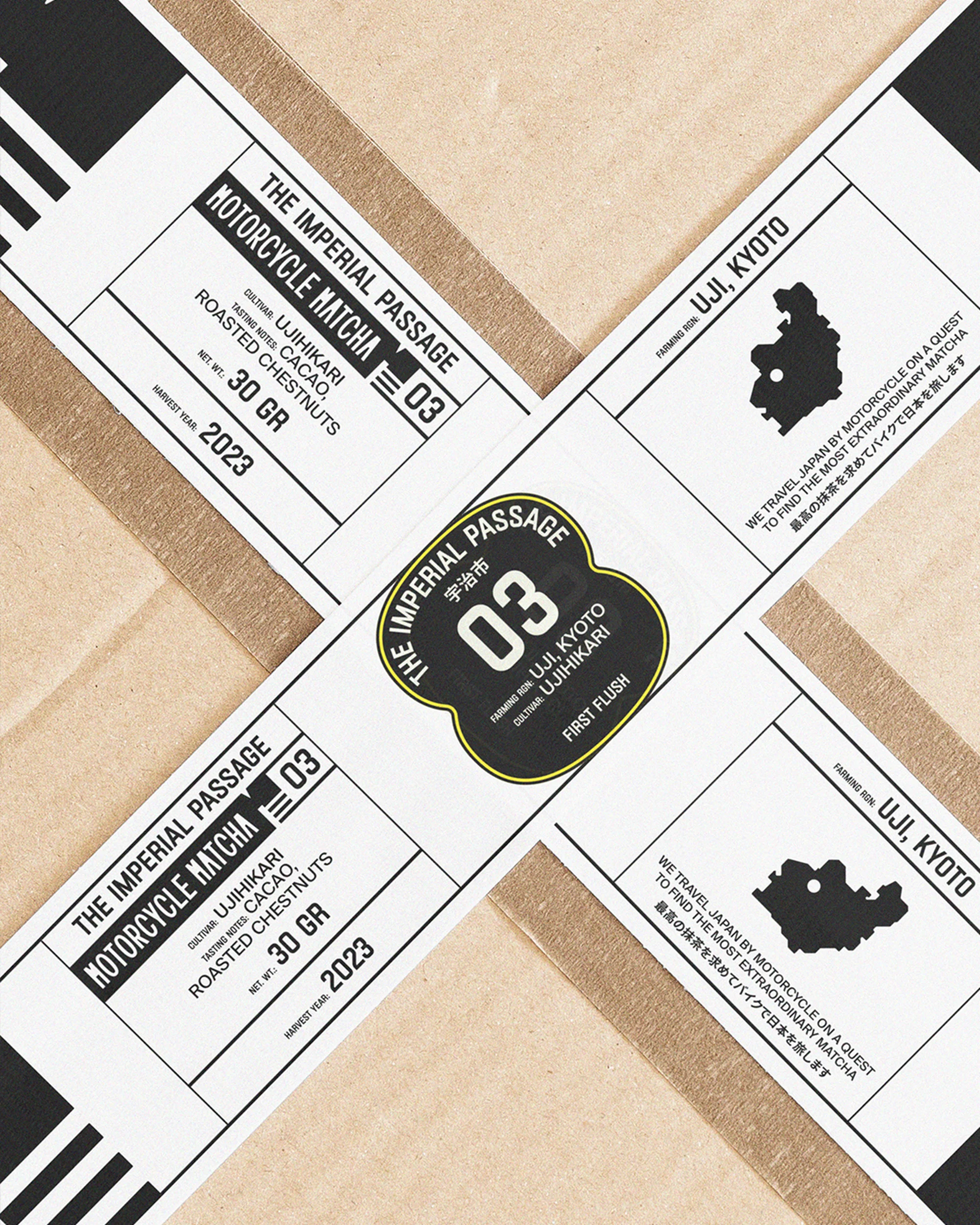 Close-up of a diagonally-oriented kraft box with a black and white product label featuring matcha and roasted chestnuts.
