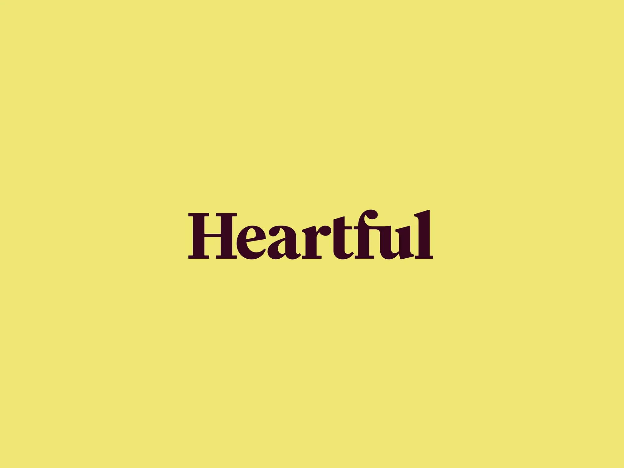 The word 'Heartful' in brown serif font is centered on a soft yellow background. The overall composition is simple and clean.