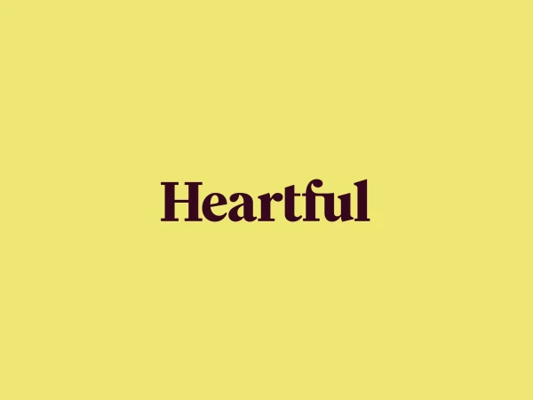 The word 'Heartful' in brown serif font is centered on a soft yellow background. The overall composition is simple and clean.