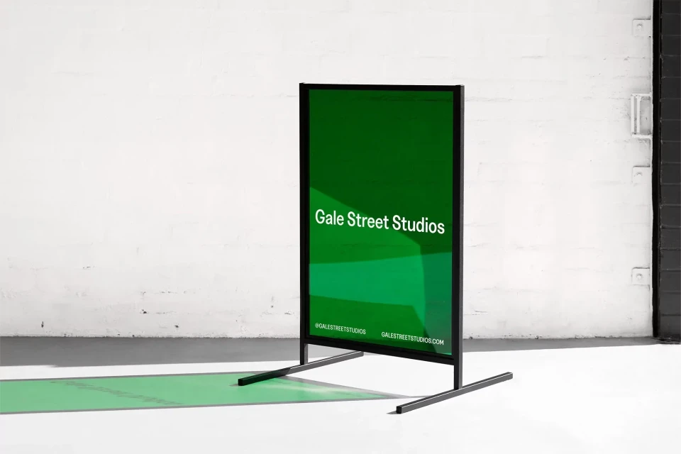 Studio advertisement display with the text 'Gale Street Studios', set against a textured white wall and gray floor.