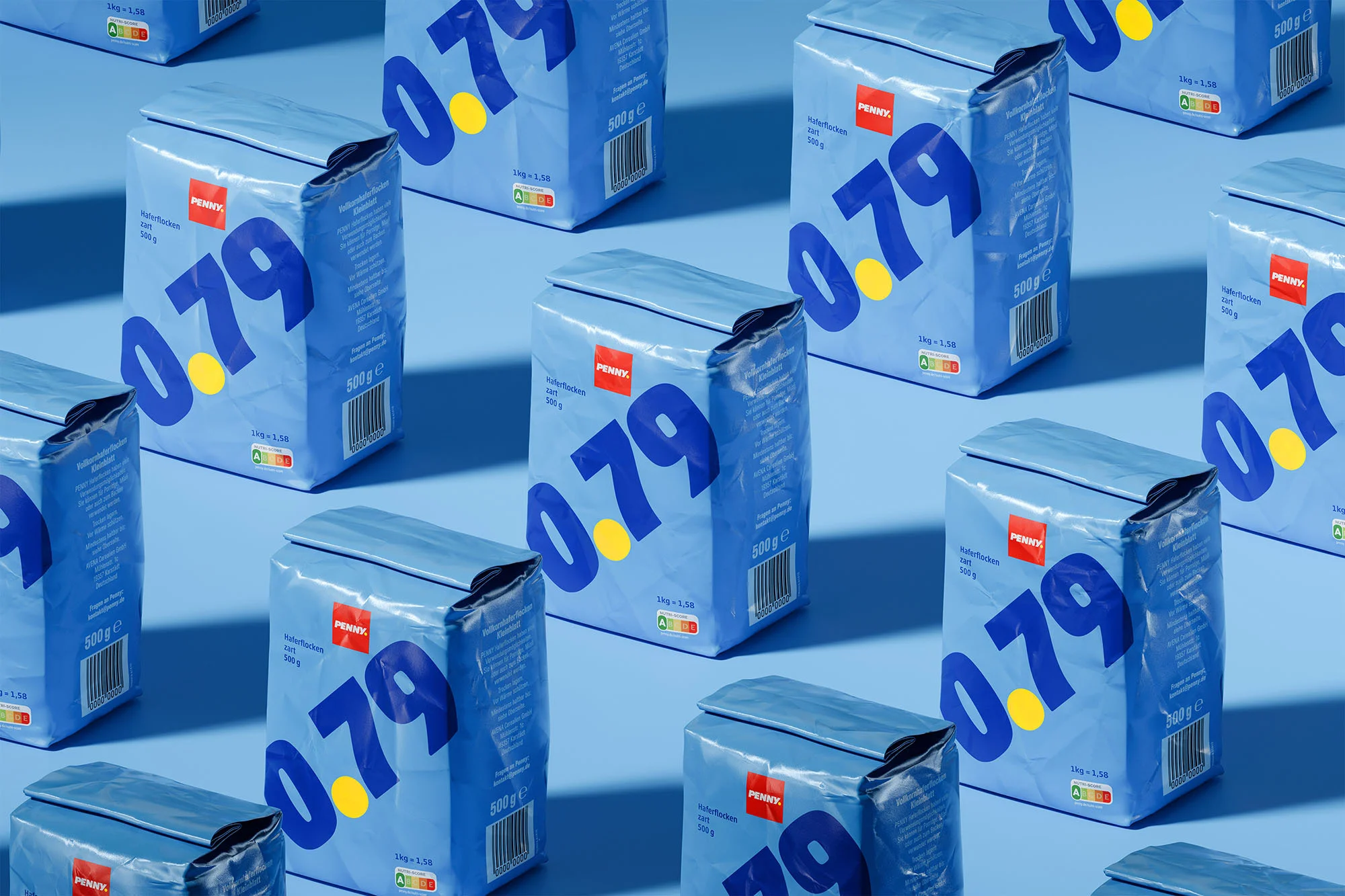 Multiple blue Penny sugar bags, each labeled with a large '0.79' price, arranged in a pattern against a light blue backdrop. Food advertising.